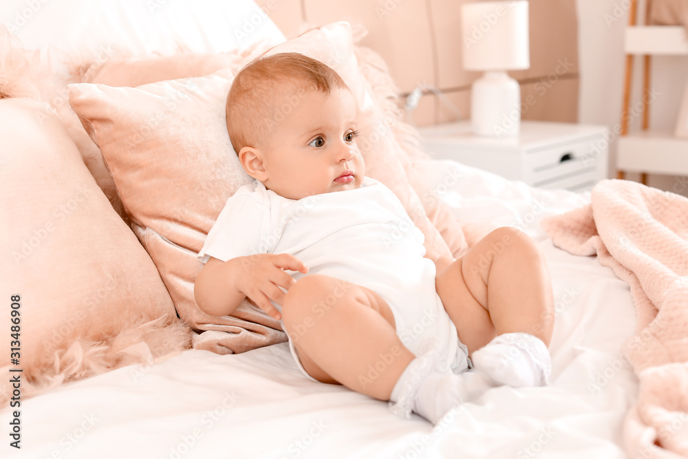 Portrait of cute little baby on bed at home Portrait of cute little baby on bed at home