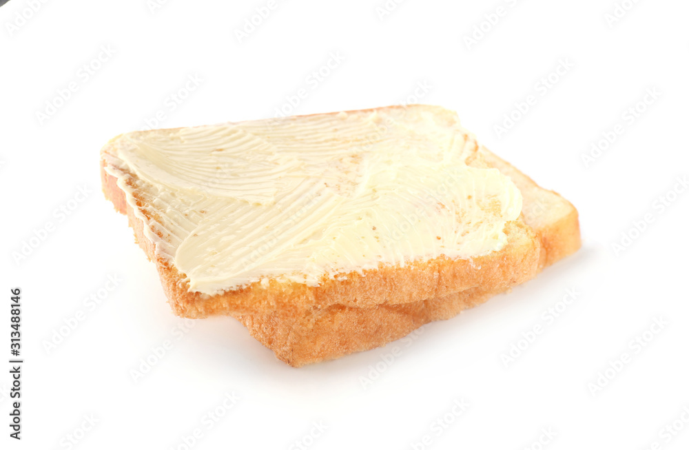 Slices of bread with butter on white background