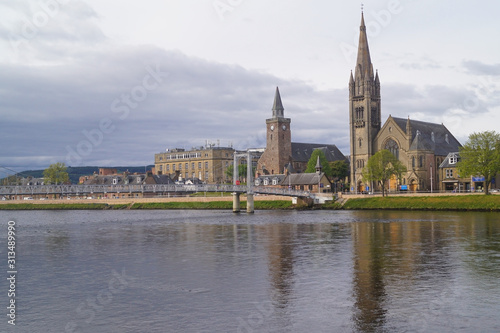 The Greig Street bridge over the river Ness and two churches in Inverness