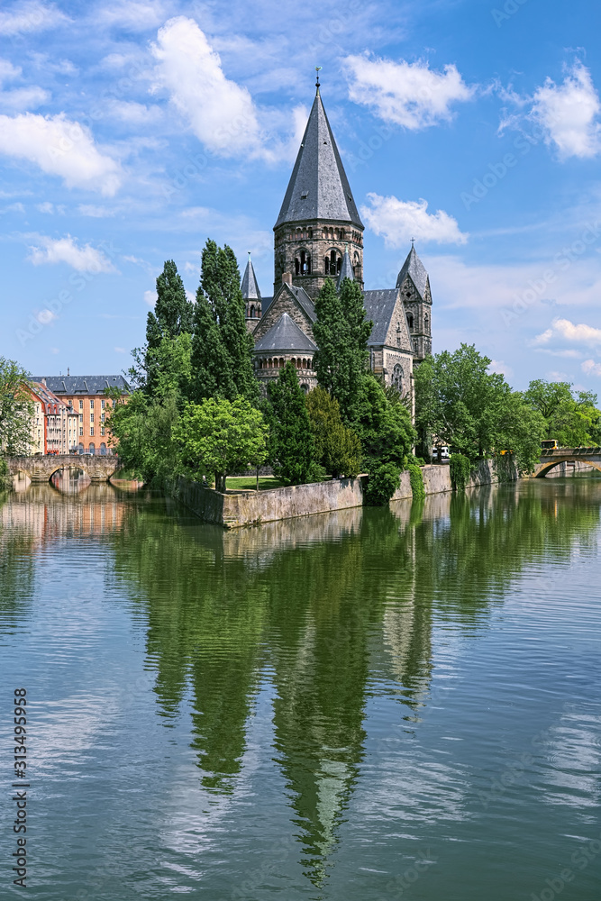 Temple Neuf (New Temple), a Protestant city church in Metz, France. View from a bridge across the Moselle river. The church was built in 1901-1904.