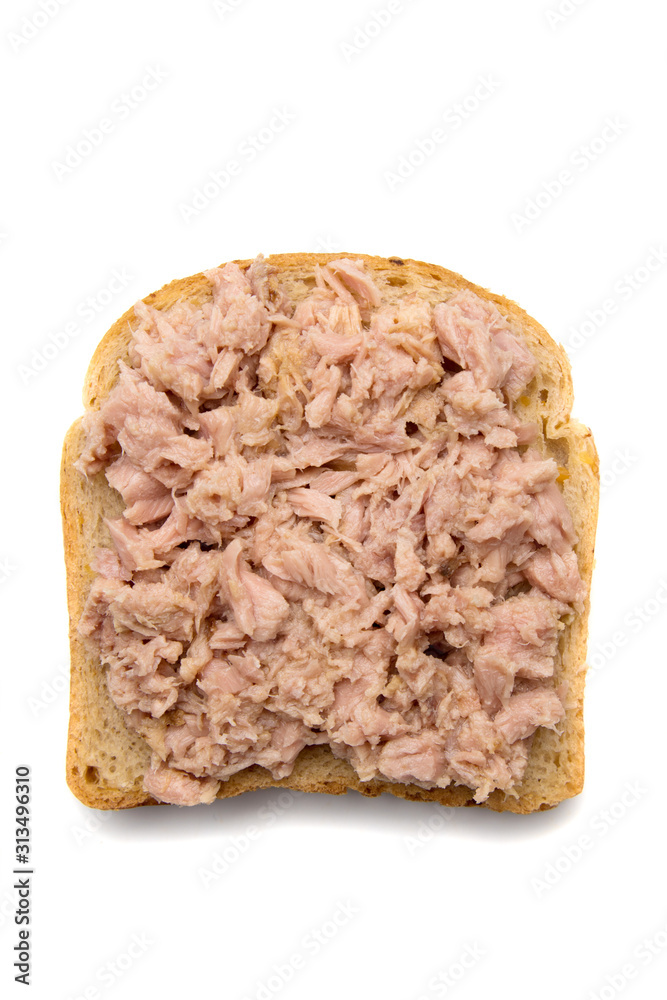 Slice of bread with spread on top Slice of bread with spread on top