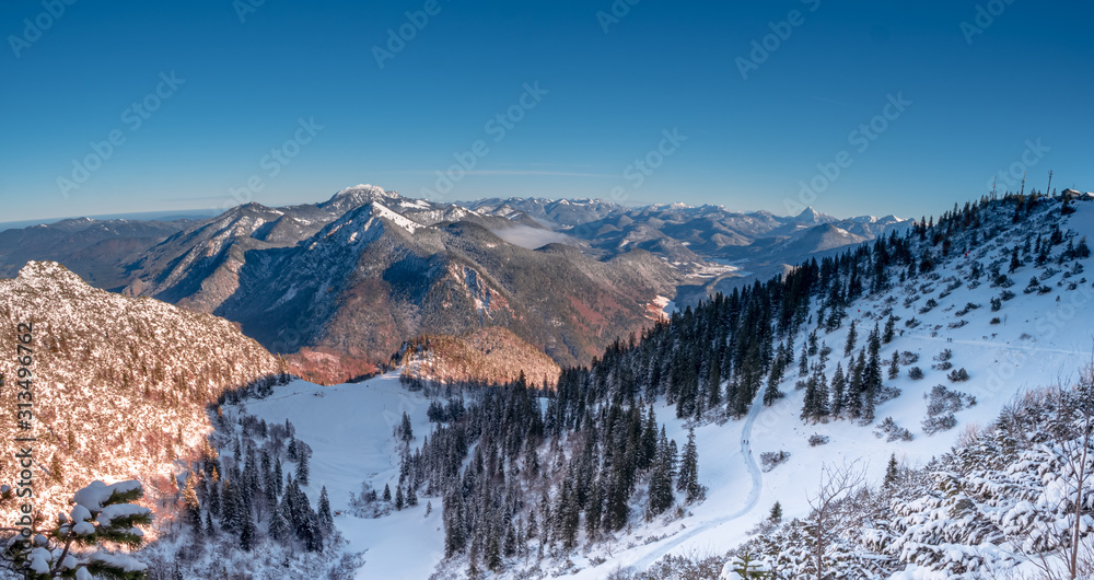 Mountain View from a Bavarian Top Point to the surrounding alp scenery during winter