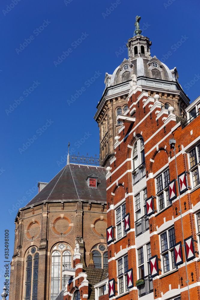 Historic buildings on the Oudezijds Kolk canal in Amsterdam, Netherlands