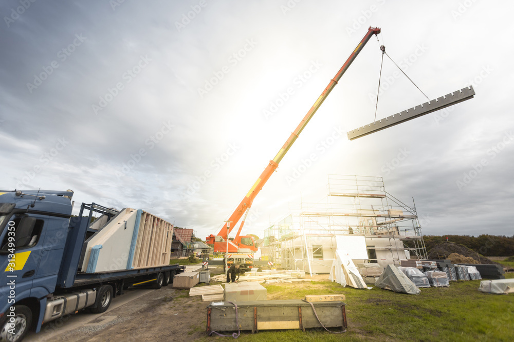Construction of a Single Family Home with the Help of a Crane Construction of a Single Family Home with the Help of a Crane
