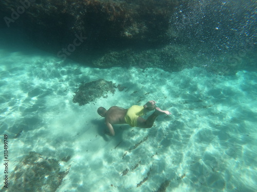 diver in the sea Snorkeling in the sea of mallorca concept of summer beach and holiday 
