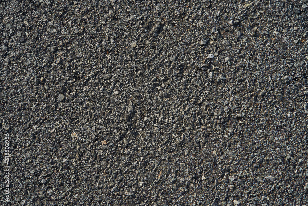 Closeup black rough asphalt road Closeup black rough asphalt road