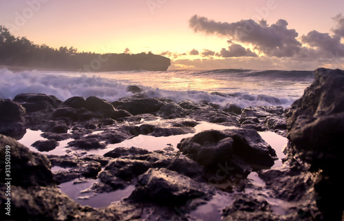 The sunrise over the beach in Kauai, Hawaii