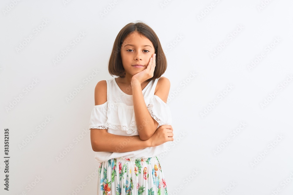 Young beautiful child girl wearing casual dress standing over isolated white background thinking looking tired and bored with depression problems with crossed arms. Young beautiful child girl wearing casual dress standing over isolated white background thinking looking tired and bored with depression problems with crossed arms.