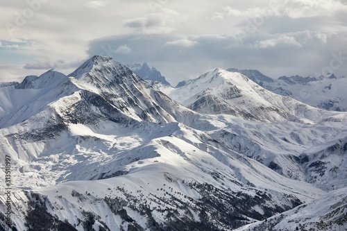 Snowy mountains in winter weather high alpine landscape