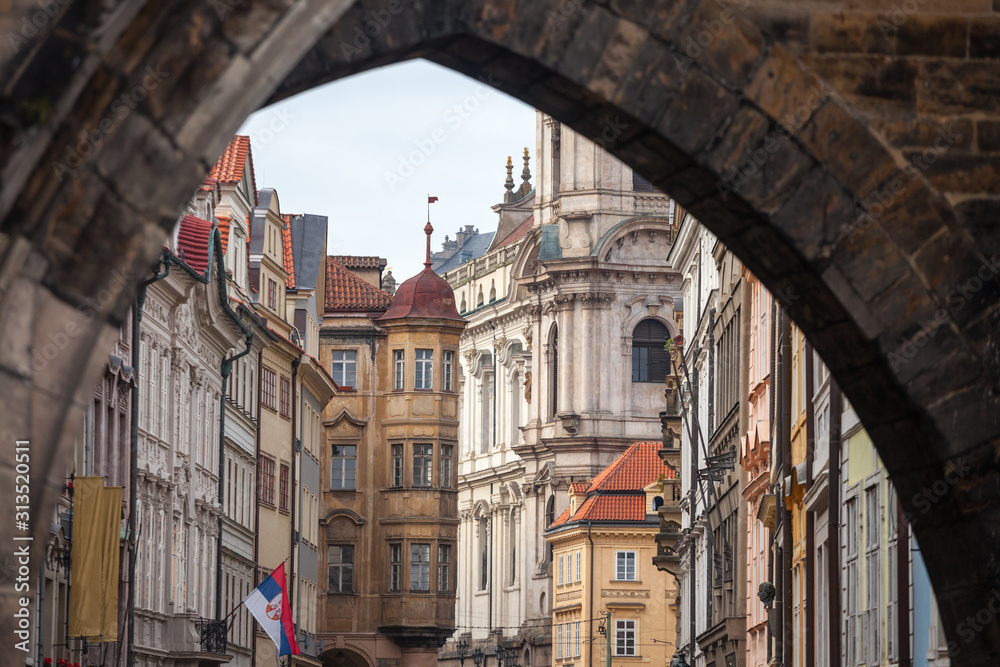 Typical Medieval buildings in the district of Mala Strana, on the Mostecka street, with  old residential buildings in the old town, the historical center of Prague, Czech Republic