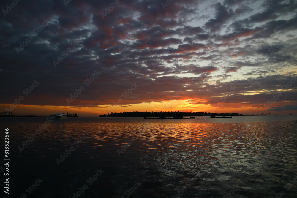 Scenic View Of Sea Against Sky During Sunset - stock photo