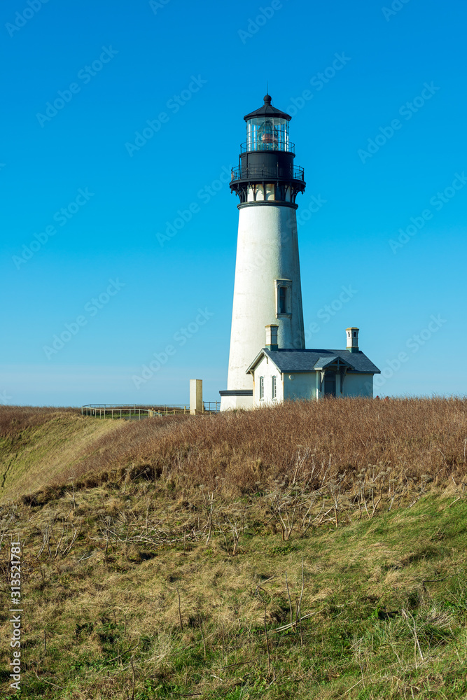 The Yaquina Head Lighthouse on the Shore of the Pacific Ocean in Newport, Oregon, USA