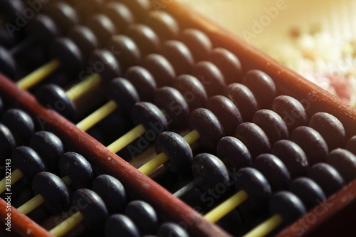 old wooden abacus on white background
