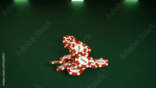 Falling stack of red casino chips in slow motion