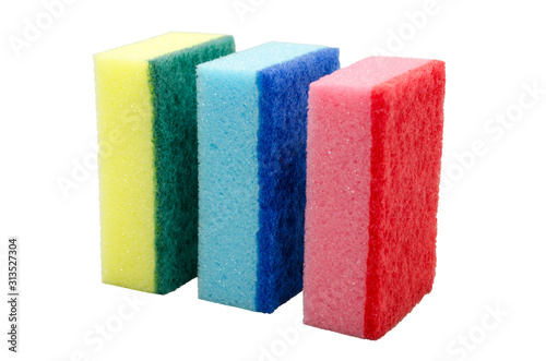 Colored sponges close up isolated on a white background without shadow. The equipment for cleaning.