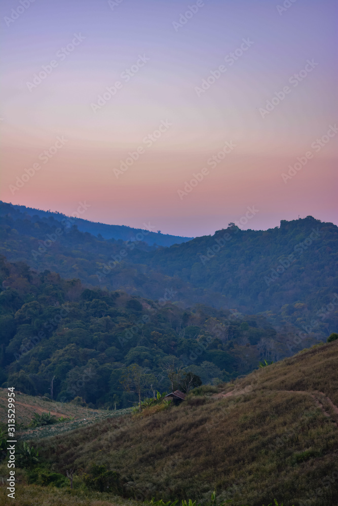 Sunset in mountains,Mountain silhouette at sunset,Beautiful sunset in the mountains,Sun set above albania mountain,Colorful sunset over the mountain hills.