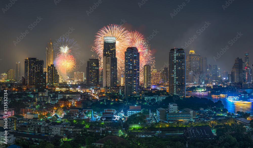 Fototapeta premium Fantastic Multicolor Firework exploding over the panorama of Bangkok Cityscape river side for Celebration, Business architecture and celebration and happy new year and merry christmas concept