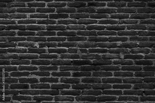 old dark brick wall cracked concrete vintage background