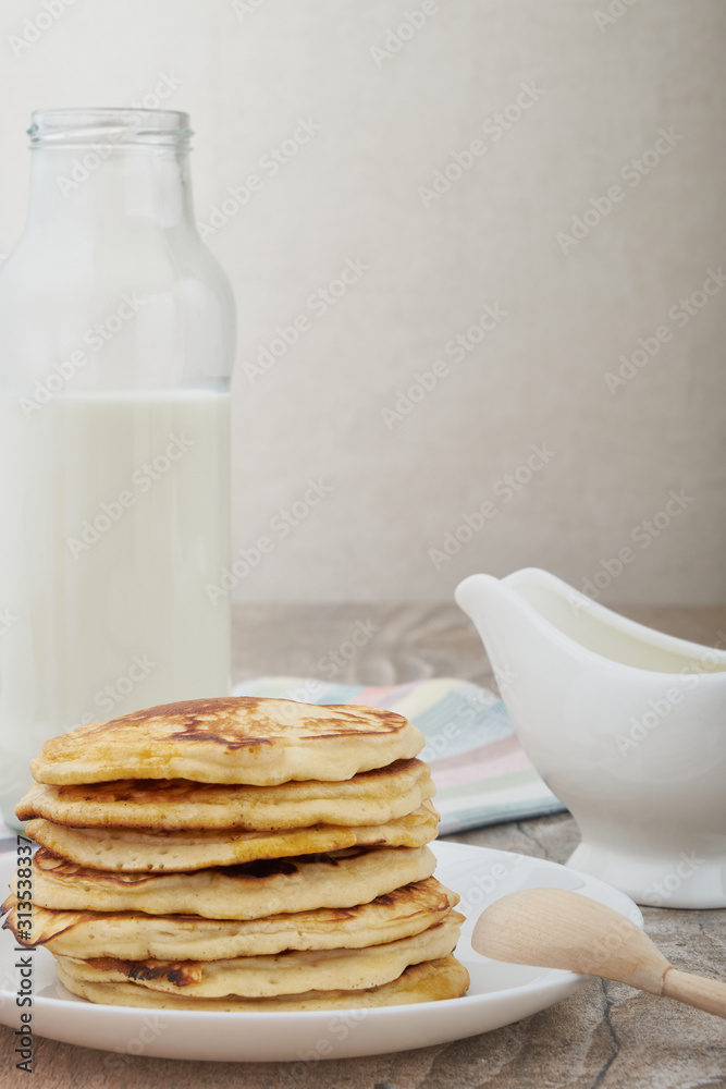 Breakfast pancakes with milk and maple syrup Breakfast pancakes with milk and maple syrup