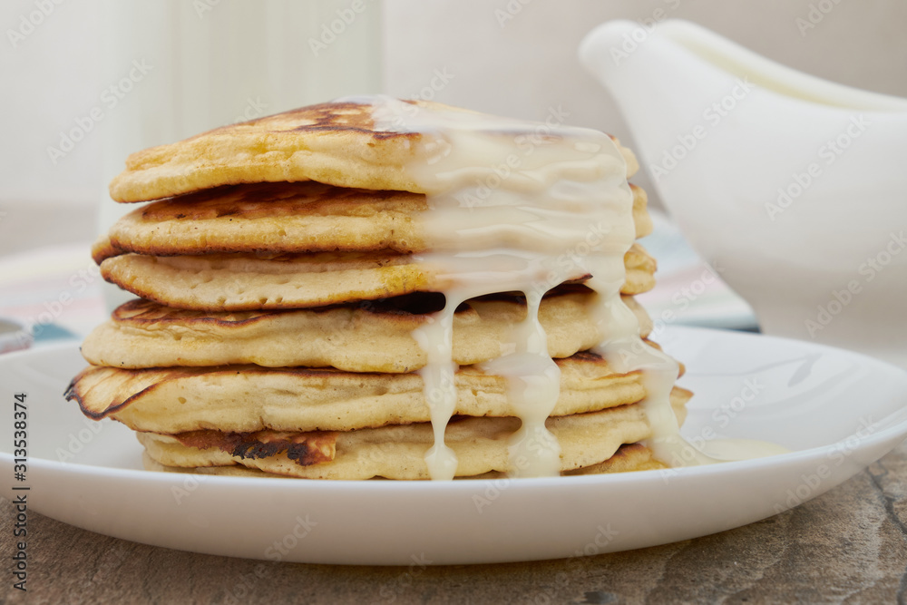 Breakfast pancakes with milk and maple syrup Breakfast pancakes with milk and maple syrup