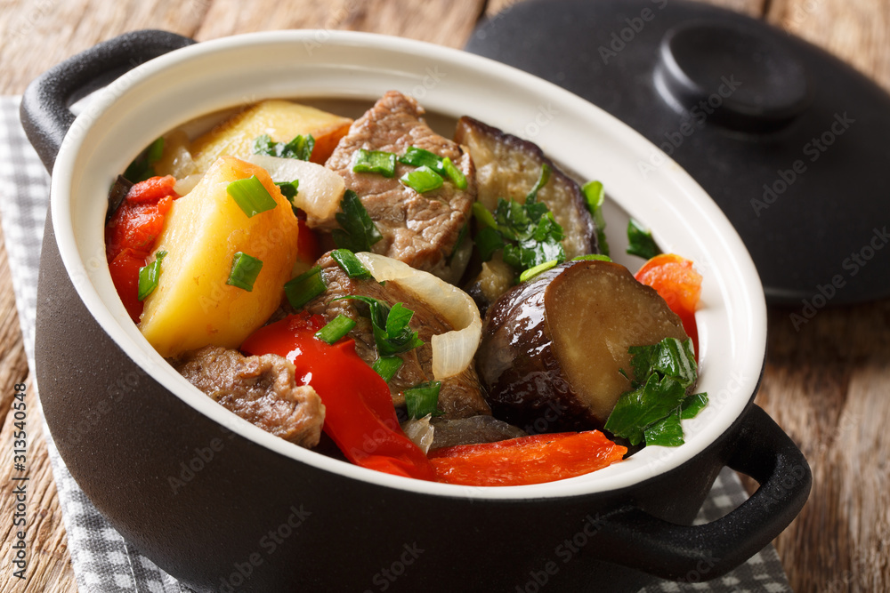 National Georgian food Chanakhi in a pot close-up. horizontal National Georgian food Chanakhi in a pot close-up. horizontal