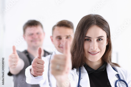 Group of doctor show OK or approval sign