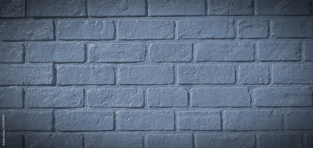 Dark grey or gray brick wall painted for background in vintage tone