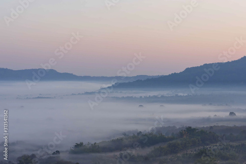 Morning mist covered by trees at Khao Takhian Ngo Phetchabun in Thailand