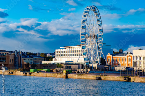 Helsinki. Finland. Ferris Wheel in Helsinki. Panorama of the city promenade. Embankment of the Baltic Sea. Marina Traveling to European cities. Scandinavia. Tour to Helsinki. Cruise to Finland #313543335