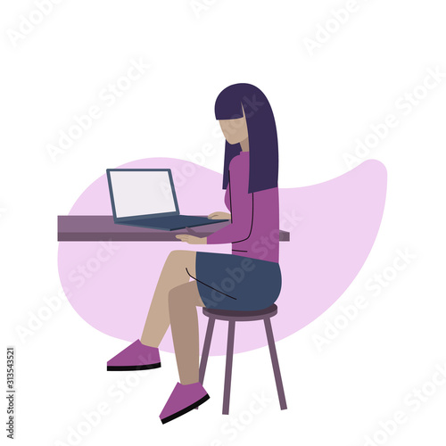 A girl working on the computer at the office or freelance