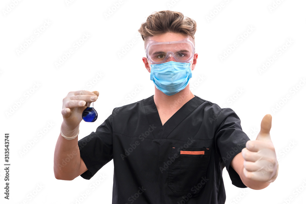 Handsome man chemist with flask making experiment in laboratory Handsome man chemist with flask making experiment in laboratory