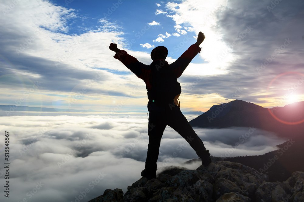 brave mountaineer who fearlessly reaches the summit of harsh mountains alone brave mountaineer who fearlessly reaches the summit of harsh mountains alone