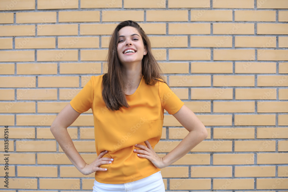 Beautiful smiling brunette model dressed in summer hipster clothes. Funny and positive woman having fun. Beautiful smiling brunette model dressed in summer hipster clothes. Funny and positive woman having fun.