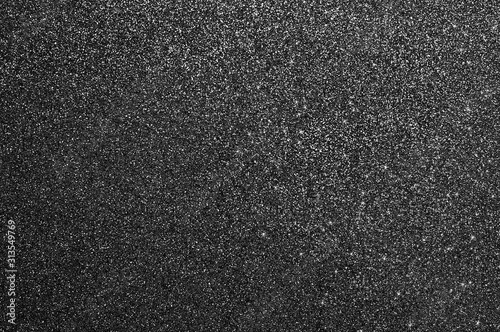 Abstract dark black and white glitter texture sparkle background