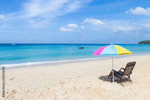 Beautiful beach in Southern Thailand, Relaxing at the beach, summer outdoor day light, Thailand holiday destination, colorful beach umbrella with beach chairs on the beach