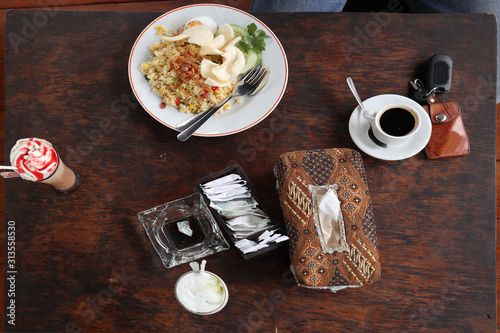 Fried rice, frappucino, espresso, foods on table top view