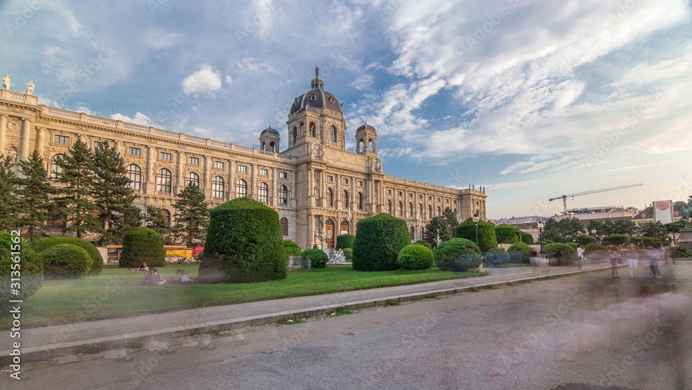 Beautiful view of famous Naturhistorisches Museum (Natural History Museum) with park and sculpture timelapse hyperlapse in Vienna, Austria. Warm light at evening