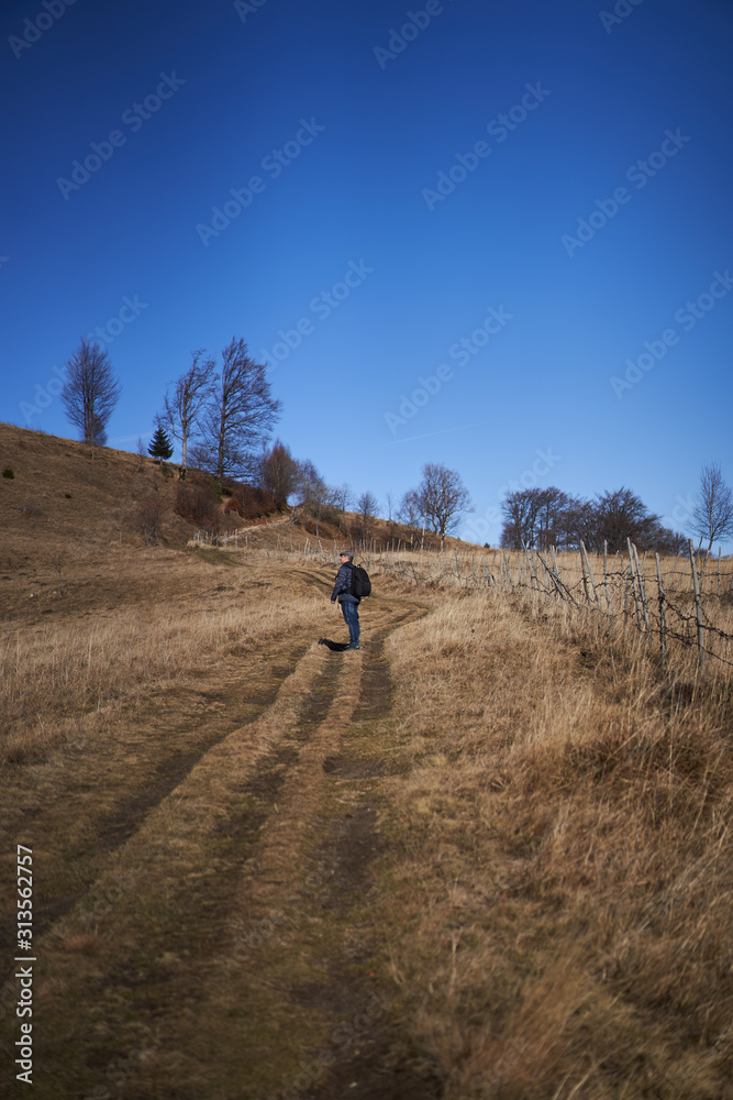 Man with backpack in the countryside