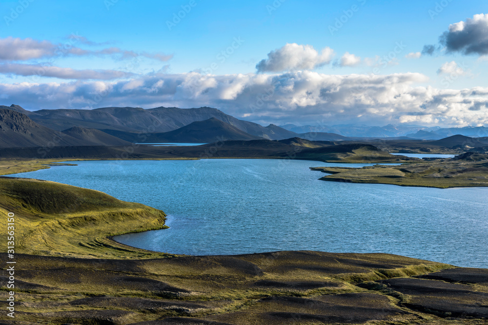 Scenic panorama of clear lake and mountains, Landmannalaugar, Iceland
