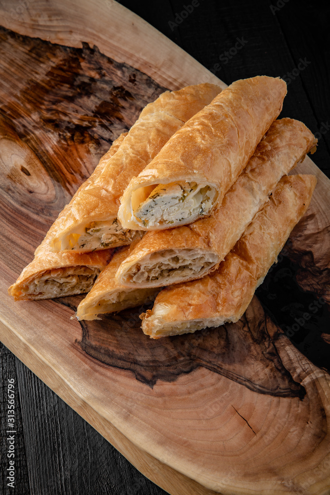 Homemade pies with cottage cheese, potatoes, or minced meat. Filled puff pastry