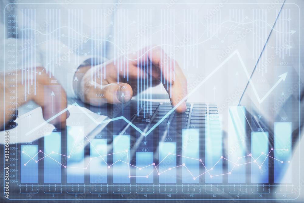 Double exposure of market chart with man working on computer on background. Concept of financial analysis. Double exposure of market chart with man working on computer on background. Concept of financial analysis.