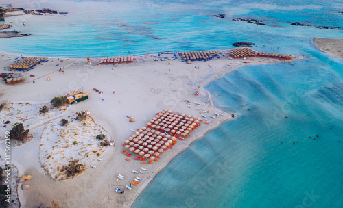 Aerial view of beautiful tropical Elafonissi Beach with pink sand. View of a nice tropical Elafonissi beach from the air. Beautiful sky, sea, resort. Elafonissi beach, Crete, Greece.