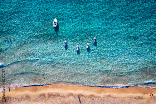 Aerial shot of beautiful turquoise beach Falasarna (Falassarna) in Crete, Greece. View of famous paradise sandy deep turquoise beach of Falasarna (Falassarna) in North West, Crete island, Greece.