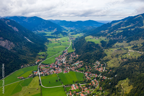 Bayrischzell municipality aerial view, with a view of Osterhofen town. German beautiful nature and green forests, Bavaria, Germany. The village Bayrischzell in mountains of Alps, Bavaria Germany. photo