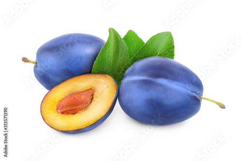 fresh plum and half with leaves isolated on white background