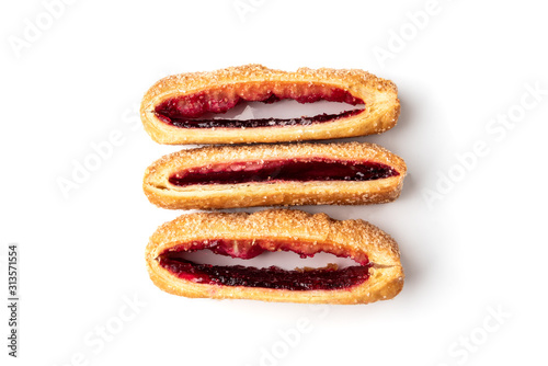 Puff pastry with cherry or raspberry jam isolated on white background.