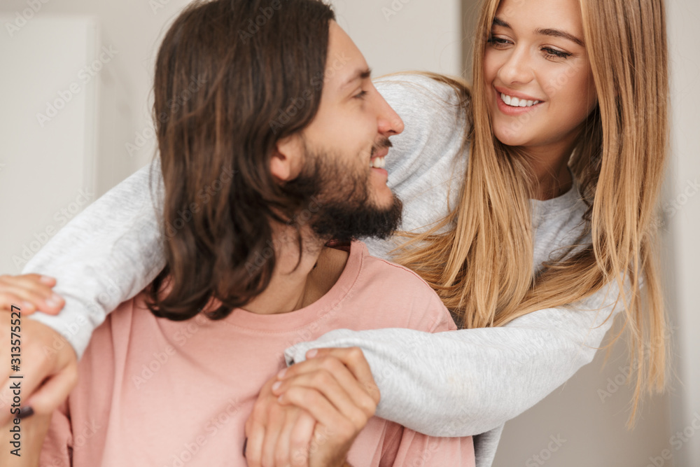 Close up of a lovely smiling couple embracing Close up of a lovely smiling couple embracing