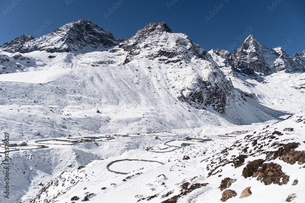 Machhermo village at 4400m in the Gokyo valley on a sunny winter day in the Himalayas in Nepal.