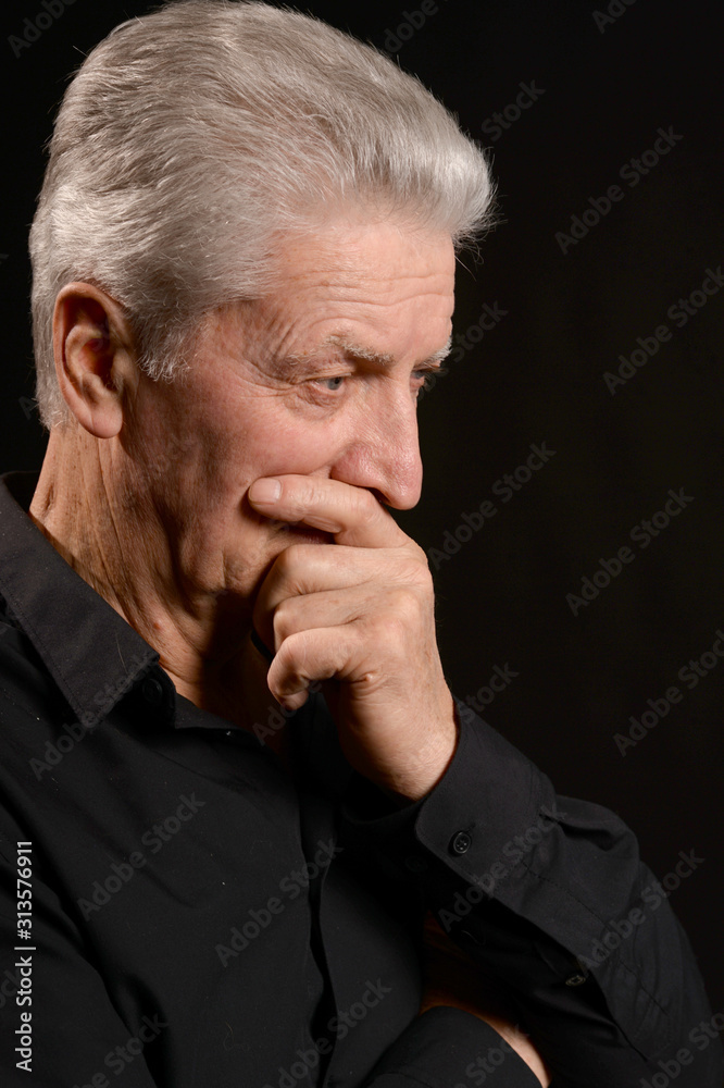 Close up portrait of thoughtful senior man Close up portrait of thoughtful senior man