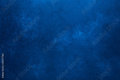 Old stone texture background toned classic blue color Copy space